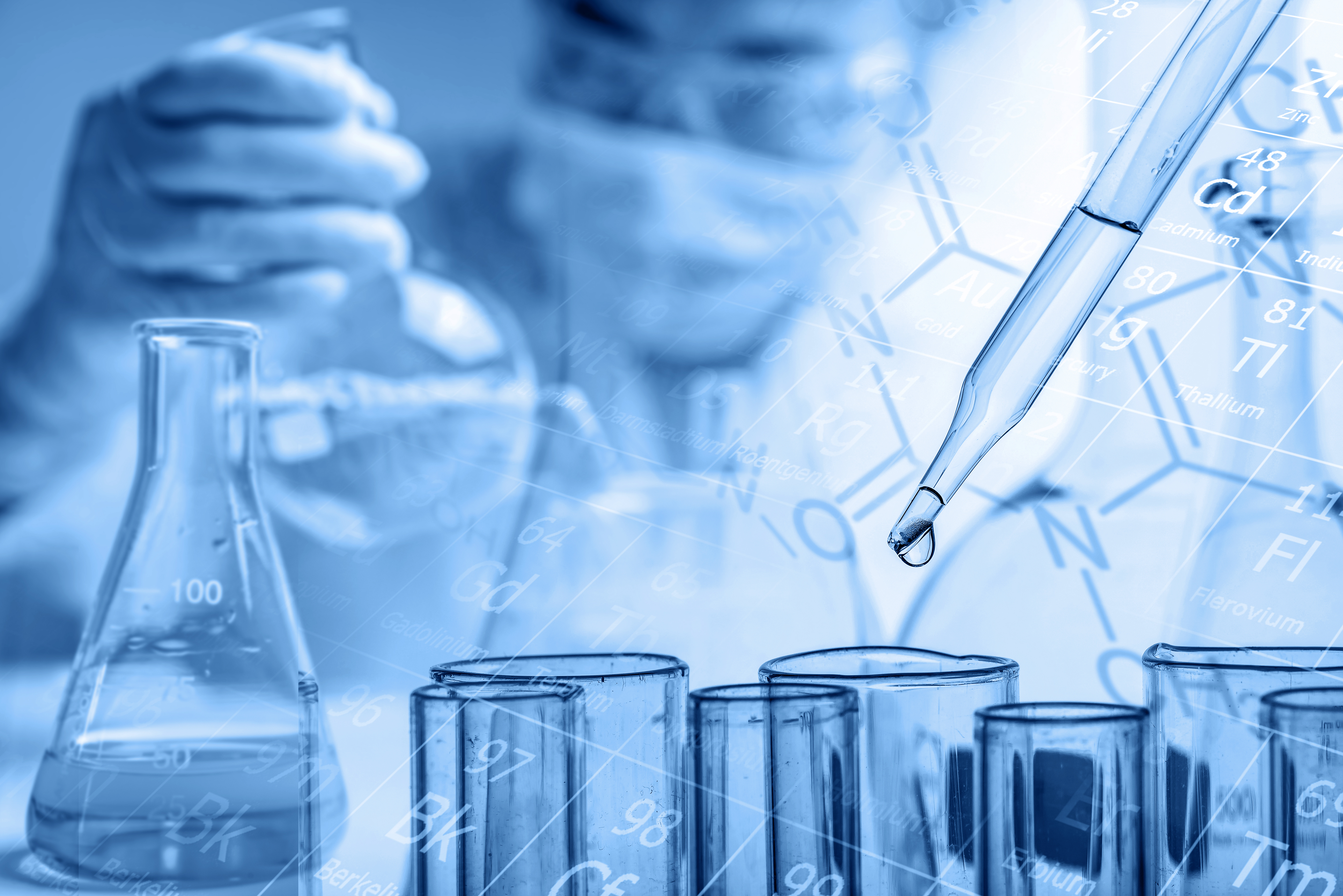 up close shot of tubes and vials and beakers in a science lab